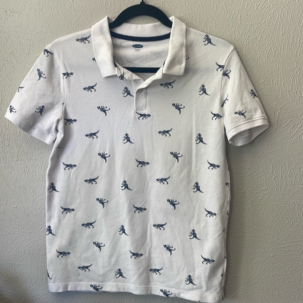 Old Navy boys collared polo. Size 14/16. XL. White with navy dinosaurs.